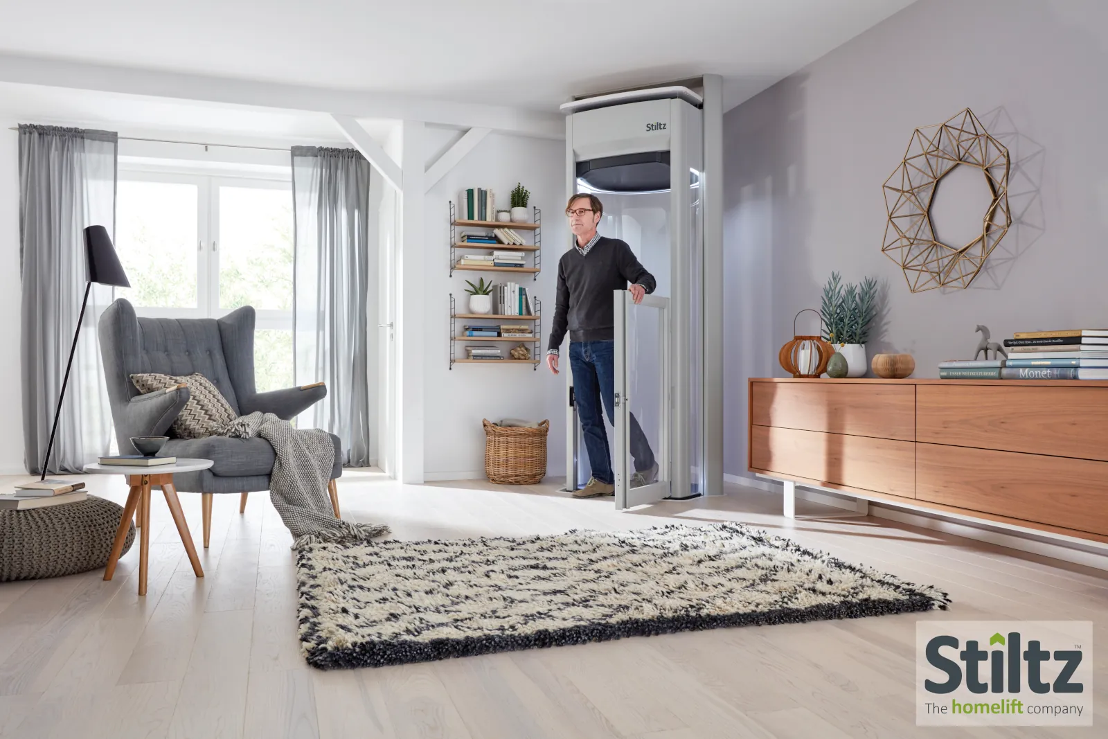 Beautiful modern home interior with a Stiltz homelift elegantly integrated into the living space